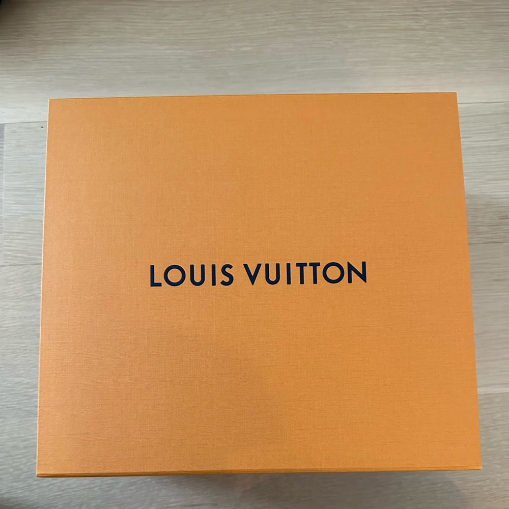 Louis Vuitton box and ribbon